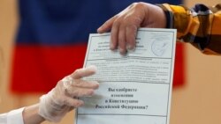 Russia, Saint Petersburg, Members of a local electoral commission count ballots at a polling station following a seven-day nationwide vote on constitutional reforms