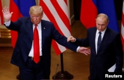 FILE - U.S. President Donald Trump and Russian President Vladimir Putin react at the end of the joint news conference after their meeting in Helsinki, Finland, July 16, 2018.