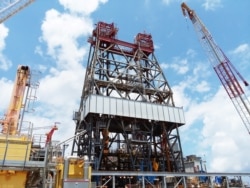 FILE - A massive drilling derrick is seen on an oil platform in the Gulf of Mexico, May 11, 2017.