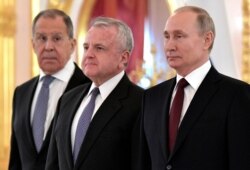 The new U.S. Ambassador to Russia John Sulliva poses after presenting his diplomatic credentials with Russian President Vladimir Putin and Russian Foreign Minister Sergei Lavrov, during a ceremony in Moscow, Feb. 5, 2020.