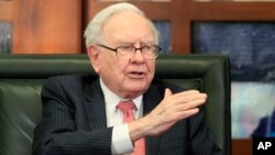 FILE - Berkshire Hathaway Chairman and CEO Warren Buffett talks during an interview by Liz Claman of the Fox Business Network in Omaha, Neb., May 8, 2017. 