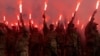 Thousands in Ukraine honor soldiers killed in blast, push to free prisoners 