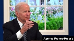 FILE - US President Joe Biden participates virtually in the annual ASEAN Summit from the South Court Auditorium of the White House, Oct. 26, 2021. 