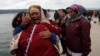 Divers Search Indonesian Lake for Nearly 200 Missing after Ferry Sinks