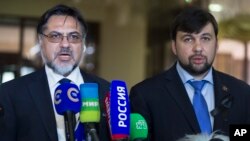 Владислав Дейнего і Денис Пушилін