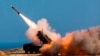 FILE - In this Nov. 8, 2017, photo from the U.S. Department of Defense, soldiers fire the Patriot weapons system at the NATO Missile Firing Installation in Greece. Sources say - unofficially - the U.S. is preparing to send the system to Ukraine to shoot incoming Russian missiles.