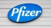 A sign in the window of an office at Pfizer Manufacturing in Puurs, Belgium, Dec. 21, 2020.