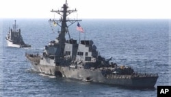 U.S. Navy destroyer USS Cole as it is towed from the port city of Aden, Yemen, on Oct. 29, 2000 (file photo).