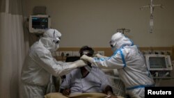 HEALTH-CORONAVIRUS-MARKERS