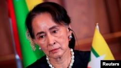 FILE - Myanmar's State Counsellor Aung San Suu Kyi attends the joint news conference of the Japan-Mekong Summit Meeting at the Akasaka Palace State Guest House in Tokyo, Japan October 9, 2018. (Franck Robichon/Reuters)