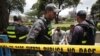Nicaraguans are detained by immigration police officers in San Jose, Costa Rica, Aug. 19, 2018.