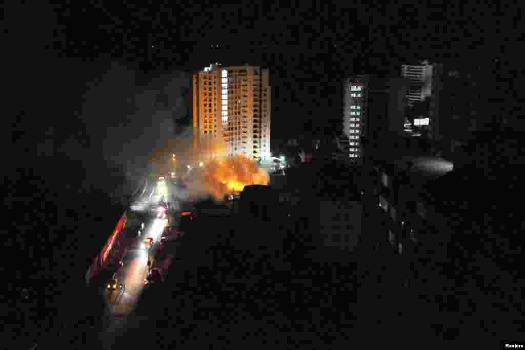 A fire is seen at Iquique city from the top floor of a building after a tsunami alarm at Iquique city, north of Santiago, April 1, 2014.
