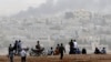 Kurd Fighters Struggle to Defend IS-Besieged City