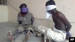 Suspected Boko Haram militants detained by military in Bukavu Barracks, Kano state, Nigeria, March 2012 file photo.