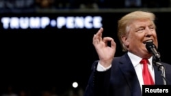 Republican U.S. presidential nominee Donald Trump speaks at a campaign rally in Wilkes-Barre, Pennsylvania, October 10, 2016. 