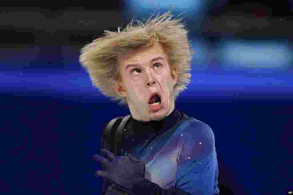 Daniel Grassl of Italy competes in the men's free skate program during the figure skating event at the 2022 Winter Olympics, in Beijing.