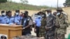 Tiga pria (kanan) yang diidentifikasi sebagai penculik siswa Sekolah Menengah Bethel Baptist ditunjukkan kepada media di Abuja, Nigeria, Kamis, 23 September 2021. (AP Photo/Gbemiga Olamikan)