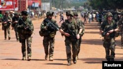 French soldiers are seen patrolling a street in Bangui December 8, 2013.