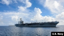 美国尼米兹号航母2020年6月24日停靠关岛（美国海军照片）