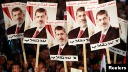 Supporters of deposed Egyptian President Mohamed Morsi protest at Rabaa al-Adawiya square in Cairo, Aug. 6, 2013. 