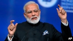 FILE - Indian Prime Minister Narendra Modi speaks in St. Petersburg, Russia, June 2, 2017. Modi and President Donald Trump meet for the first time this week.