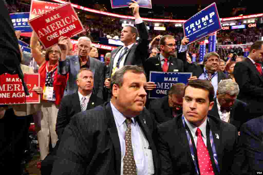 Former Governor of New Jersey Chris Christie, a finalist for Trump's vice president slot, watches the Republican presidential nominee speak.