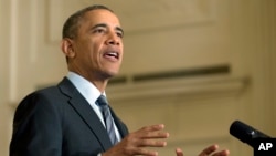 Presiden Amerika Barack Obama menyampaikan pidato di Gedung Putih, Washington, D.C (31/1).