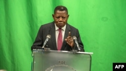 FILE - DRC government spokesperson Lambert Mende speaks in Kinshasa, Aug. 8, 2018.