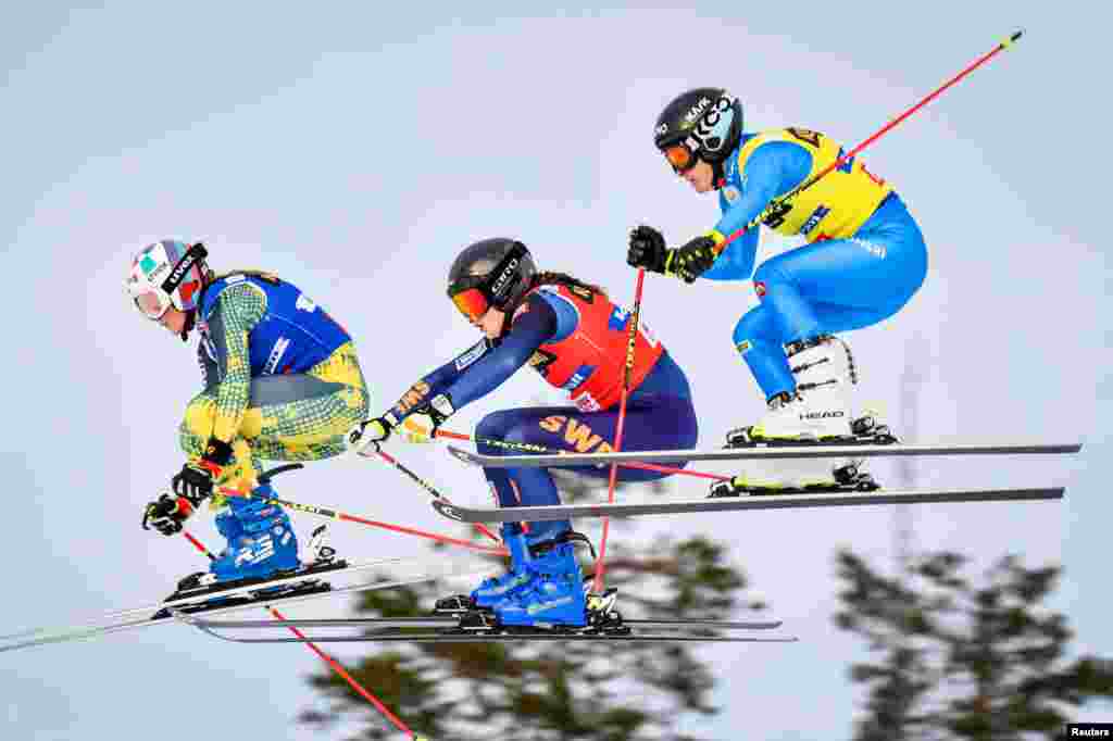 Germany's Daniela Maier, Sweden's Alesandra Edemo and Italy's Jole Galli compete during the women's semi final of the FIS Freestyle Ski Cross World Cup in Idre, Sweden, Jan. 23, 2022.