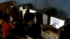 FILE - Indonesian youths browse their social media accounts at an Internet cafe in Jakarta, Indonesia.