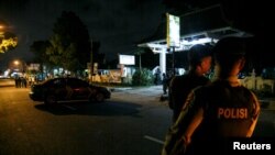 Polisi tengah berada di lokasi penembakan di kawasan Sleman, Yogyakarta, 14 Juli 2018.