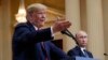 FILE - U.S. President Donald Trump gestures as Russian President Vladimir Putin looks on in Helsinki, Finland, July 16, 2018.