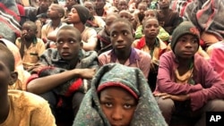 A group of schoolboys are pictured Dec. 18, 2020, in Katsina, Nigeria, following their release after they were kidnapped last week.