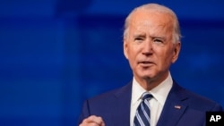 President-elect Joe Biden speaks at The Queen theater in Wilmington, Del., Dec. 9, 2020.