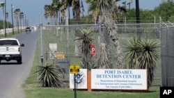 FILE - A U.S. Border Patrol truck enters the Port Isabel Detention Center, which holds detainees of U.S. Immigration and Customs Enforcement in Los Fresnos, Texas, June 26, 2018.