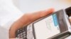 WHO Panel Cites 'Possible' Brain Cancer Risk from Cell Phone Use