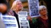 Hundreds Rally in Australia For, Against Refugee Housing