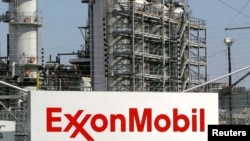 FILE - A view of the Exxon Mobil refinery in Baytown, Texas, Sept. 15, 2008. 