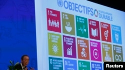 FILE - Then-U.N. Secretary-General Ban Ki-moon addresses a development conference in Zurich, Jan. 22, 2016. Behind him on a screen are displayed the 17 goals of the U.N. 2030 Agenda for Sustainable Development.