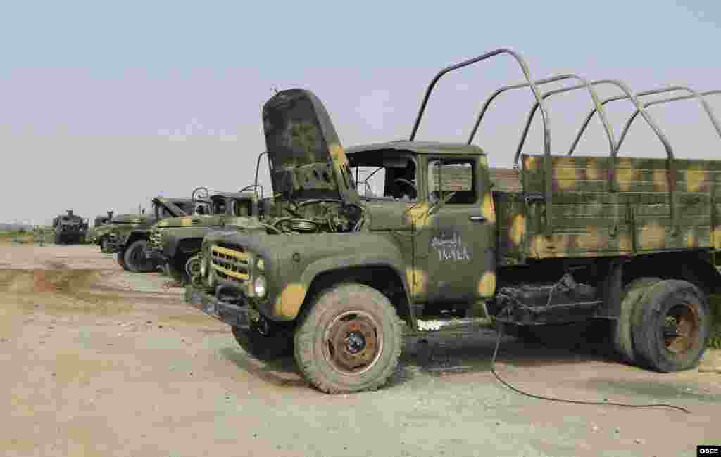 A view shows military vehicles which belonged to forces loyal to Syrian President Bashar al-Assad forces at 80th Brigade's base after it was seized, Feb. 23, 2013.
