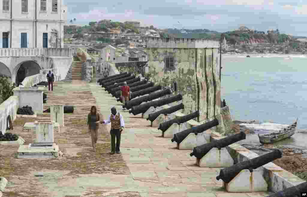 First lady Melania Trump tours Cape Coast Castle with Cape Coast Castle museum educator Kwesi Essel-Blankson in Cape Coast, Ghana, Oct. 3, 2018.