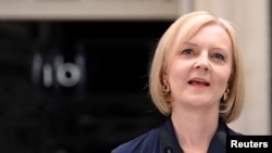 New British Prime Minister Liz Truss delivers a speech outside Downing Street, in London, Britain September 6, 2022. REUTERS/Toby Melville