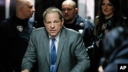 Harvey Weinstein leaves a Manhattan courthouse during his rape trial, Feb. 18, 2020, in New York. 