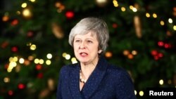 英国首相特蕾莎·梅在不信任投票举行后发表讲话。（2018年12月12日）