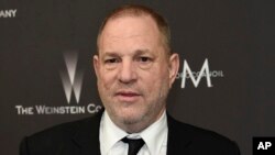 FILE - Harvey Weinstein arrives at The Weinstein Company and Netflix Golden Globes afterparty in Beverly Hills, California, Jan. 8, 2017. 
