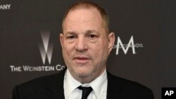 FILE - Harvey Weinstein arrives at The Weinstein Company and Netflix Golden Globes afterparty in Beverly Hills, California, Jan. 8, 2017.