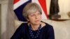 Report: Britain’s May to Shuffle Cabinet; Top Spots Safe