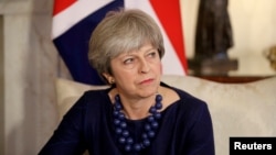 Britain's Prime Minister Theresa May is seen at 10 Downing Street, London, Dec. 5, 2017.