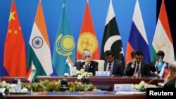 Delegasi India menghadiri rapat pleno pertemuan puncak keamanan Organisasi Kerja Sama Shanghai di Beijing, China, 22 Mei 2018.