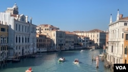 The tides have receded with tourists returning for carnival month in Venice, Feb. 11, 2020. (Sabina Castelfrance/VOA)